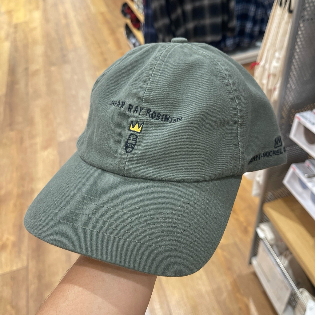 Topi Uniqlo JEAN MICHEL BASQUIAT green