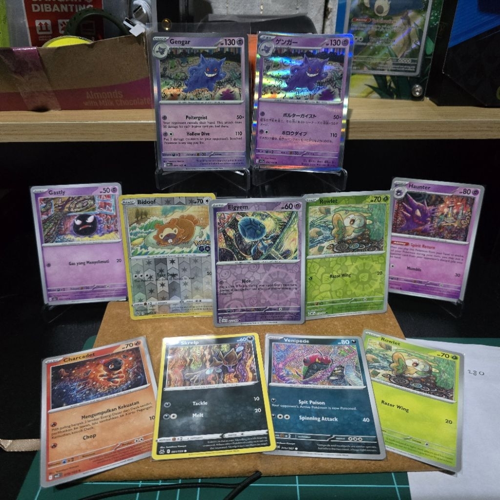 Tomokazu Komiya illustration's card: Gengar, gastly, haunter,rowlet,elgyem,bidoof pogo,charcadet,ven