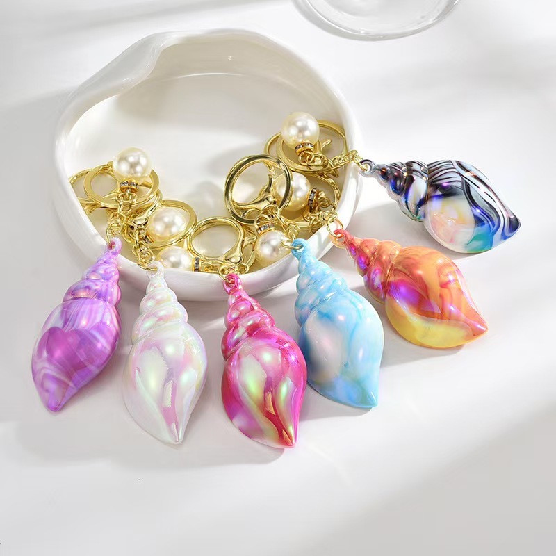 Gantungan kunci dan hiasan tas berbentuk kerang yang kreatif