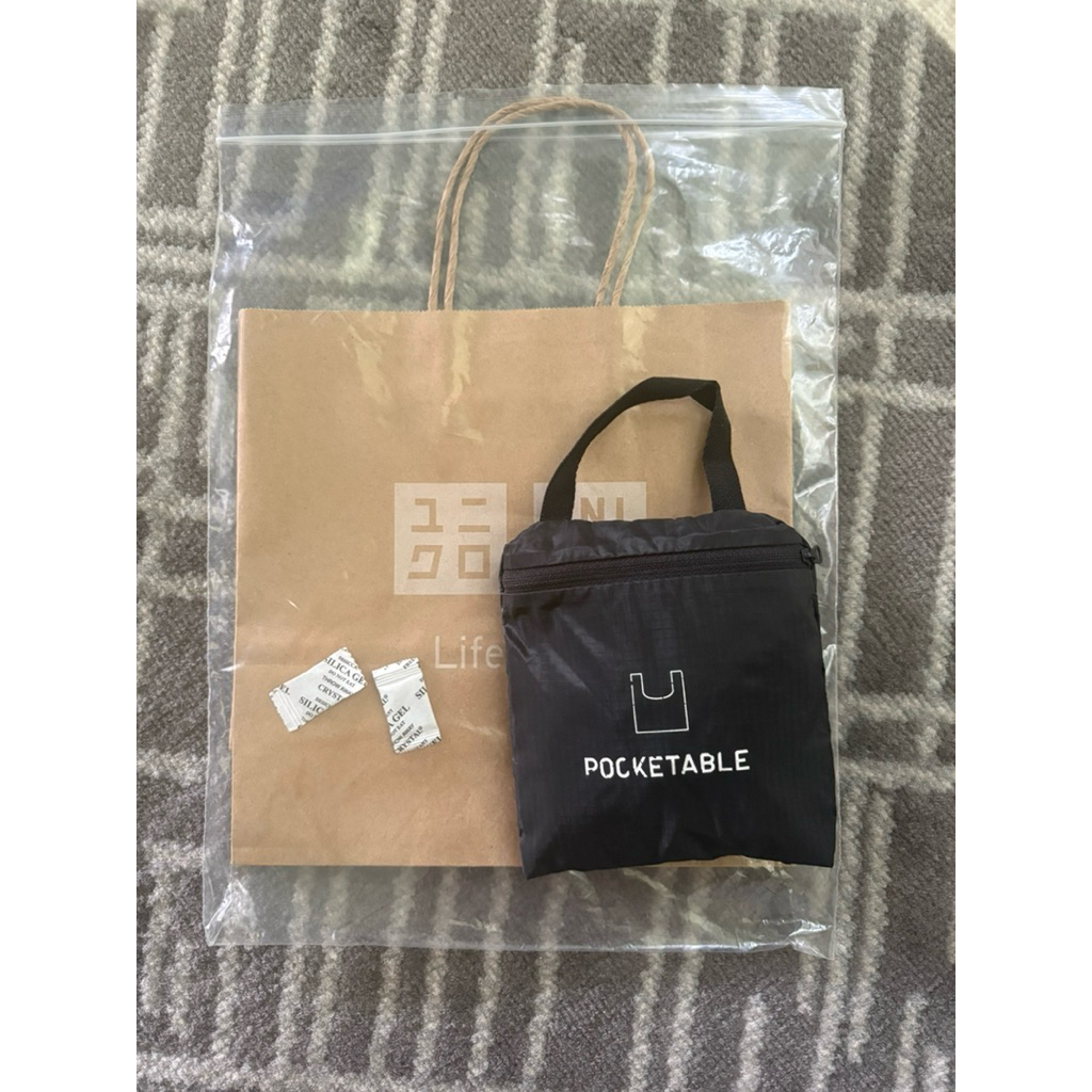 uniqlo pouch tas lipat serbaguna original