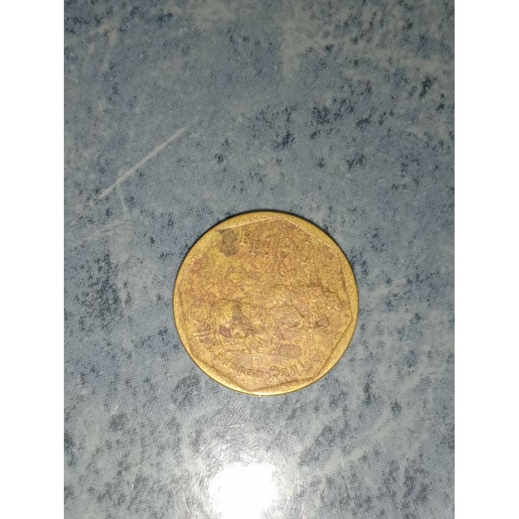 KOIN 100 RUPIAH KUNO ( original ) INDONESIA