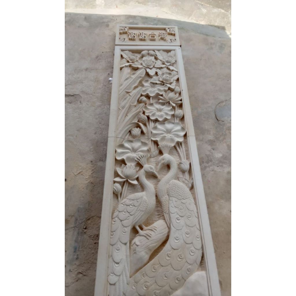 ornamen motif merak batu ukir batu paras tempel dinding