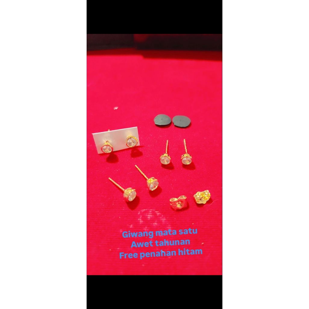 giwang mata satu titanium asli