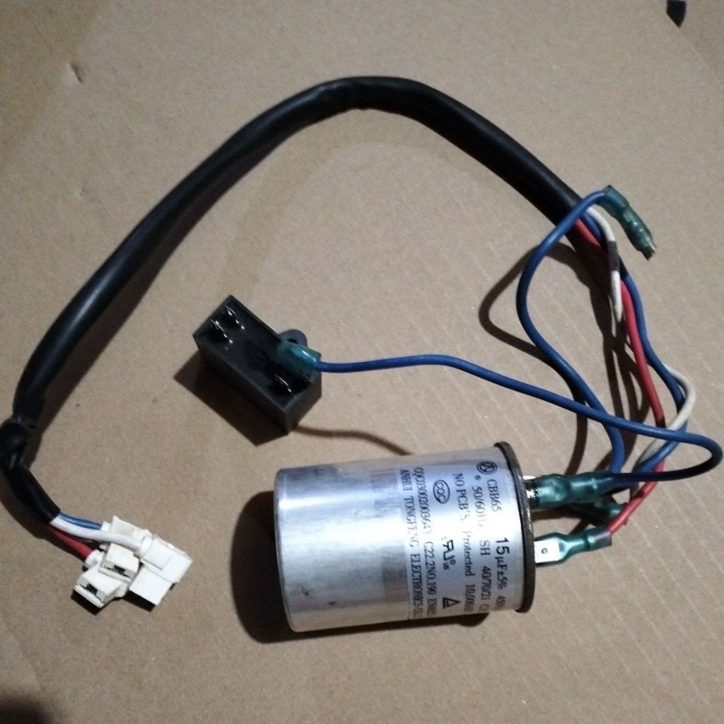 capasitor AC Akari 1/2pk original 15uf