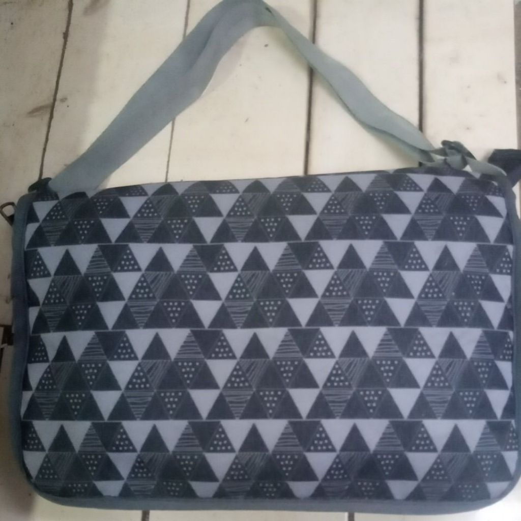 tas gendong sangkar burung