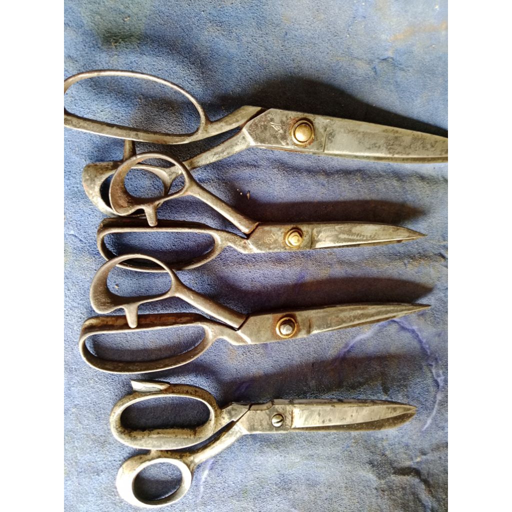 gunting Kain lawas baut keling