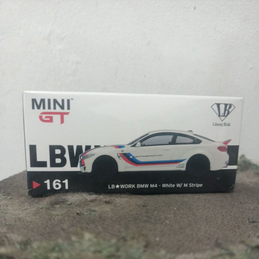 Mini GT//161 LB-Works BMW M4 White W/M Stripe - Free Protektor