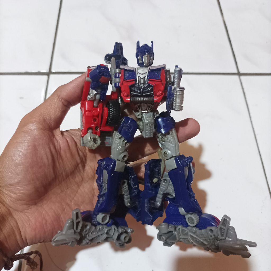 Original Hasbro Transformers DOTM Voyager Optimus Prime Mainan Action Figure