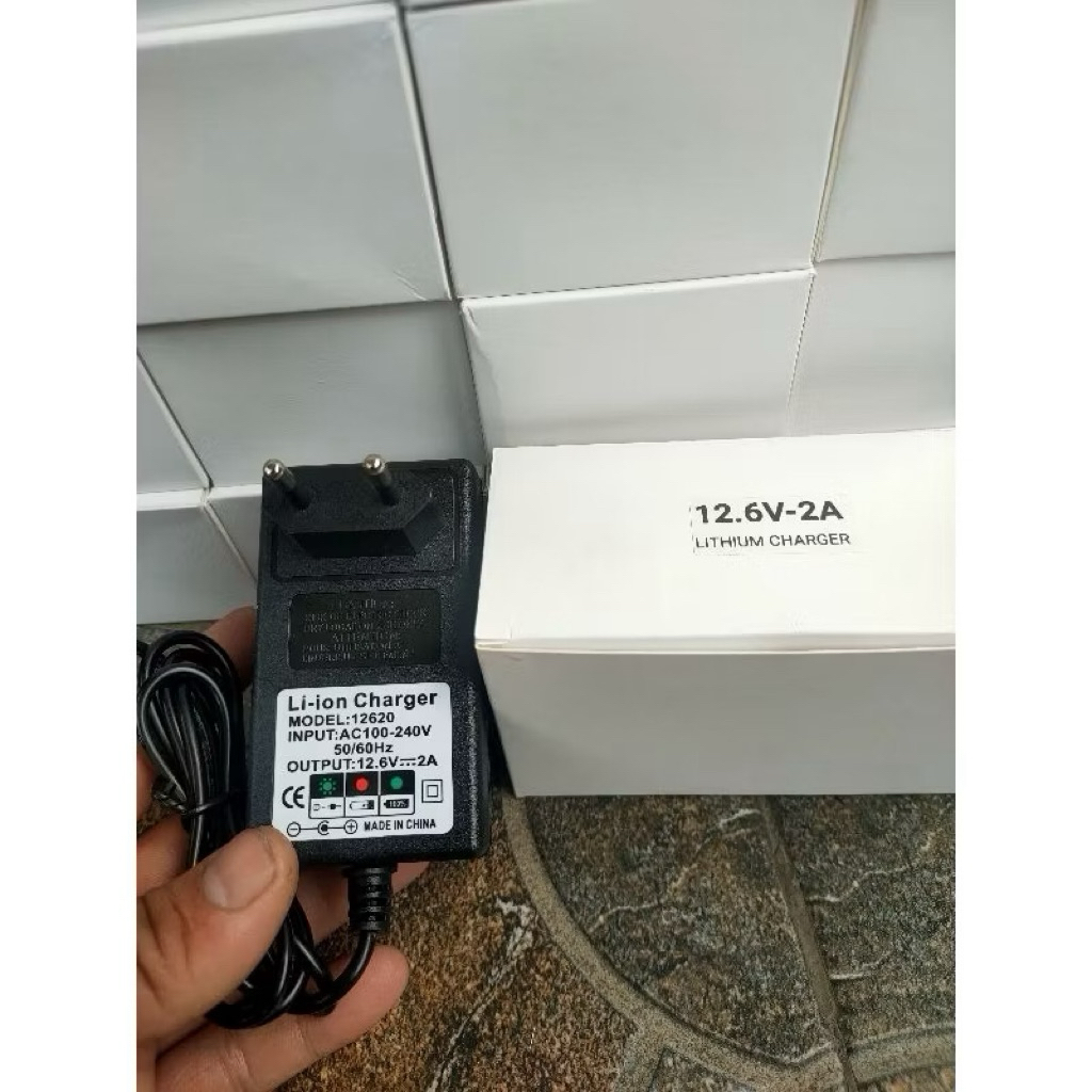Adaptor Charger 12.6 volt, 25.2 volt, 16.8 volt, 8.4 volt, 2 Amper. Cas Baterai Litium Ion
