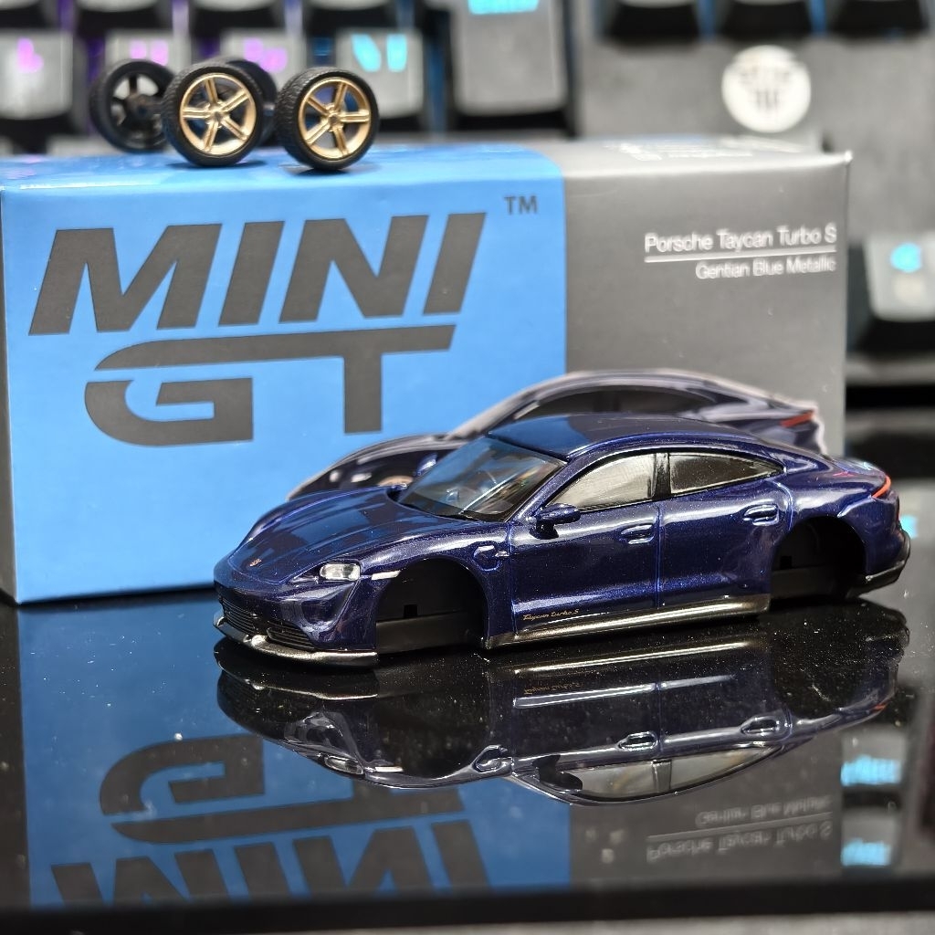 Mini GT Porsche Taycan Blue diecast 1/64