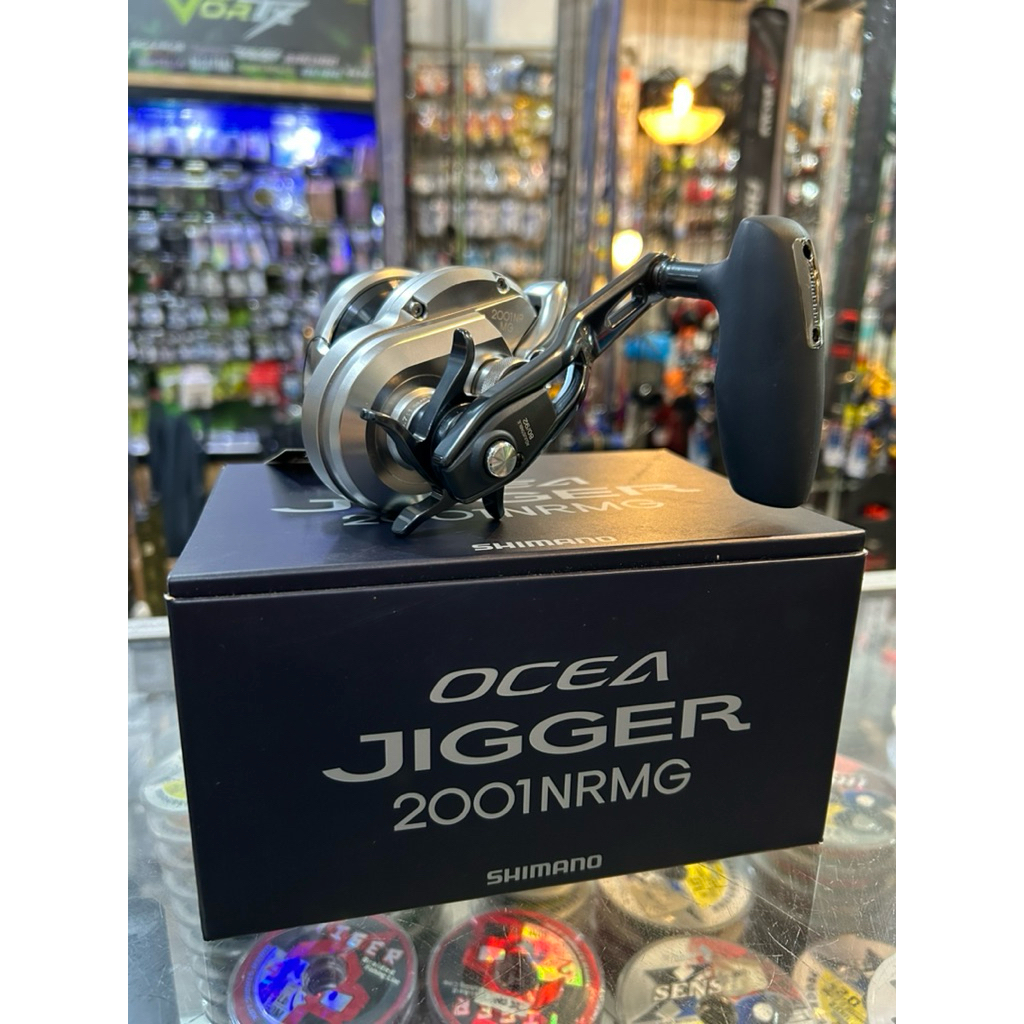 reel OH shimano (original)ocea jigger 2001nrmg handle kiri