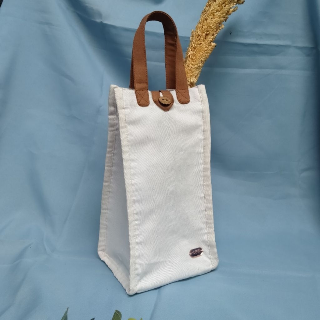 Souvenir tas tumbler bahan Blacu furing spunbond tebal