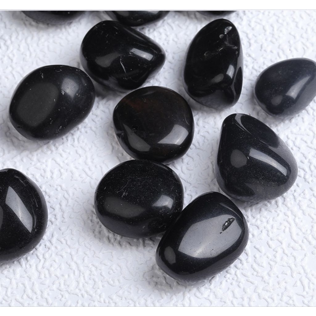 batu akik black obsidian yang di haluskan dan di rapikan jadi bongkahan tunggal