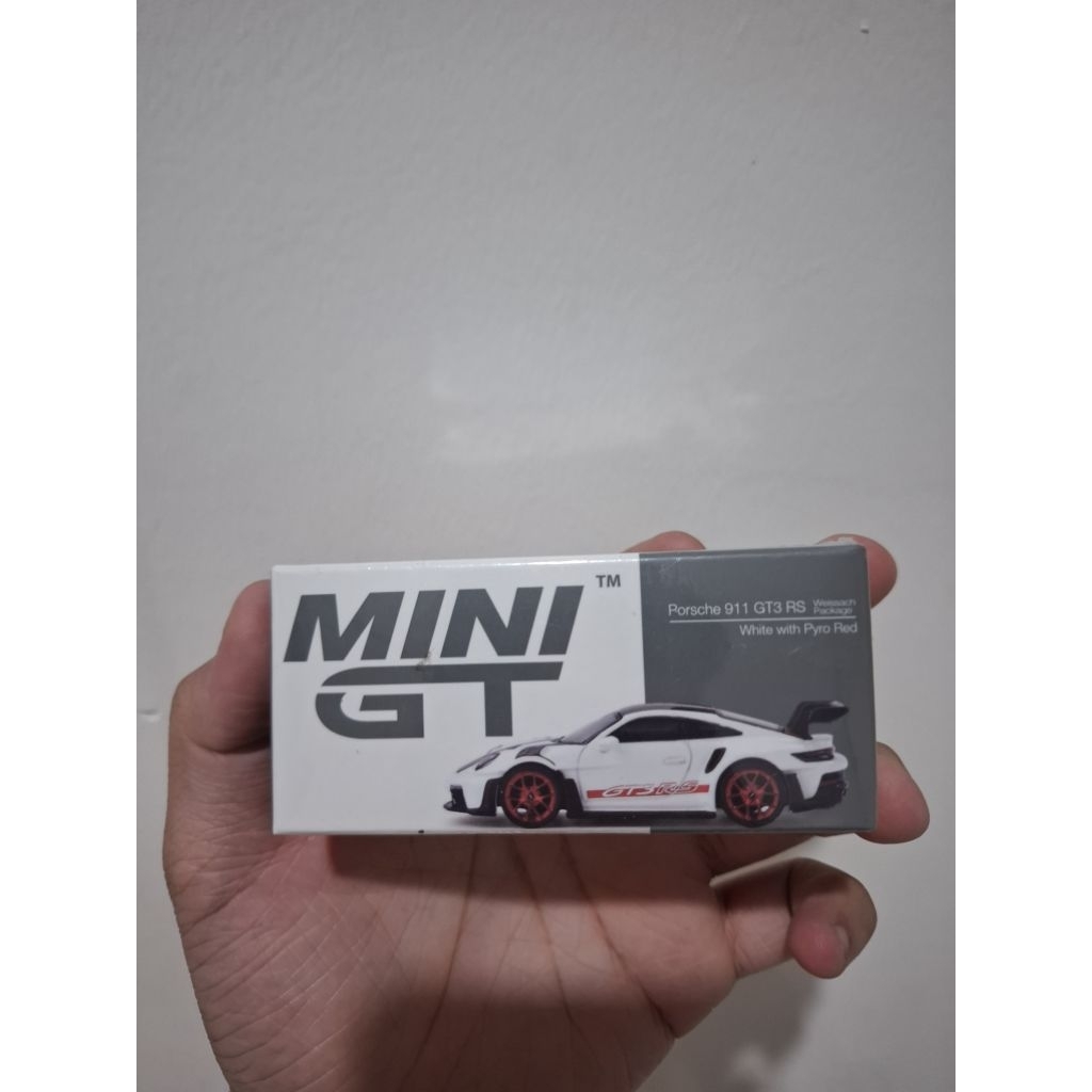 MiniGT 706 Porsche 911 GT3 RS Weissach Package White With Pyro Red