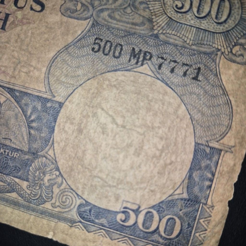 500 Rupiah Seri Bunga Hampir Solid 7
