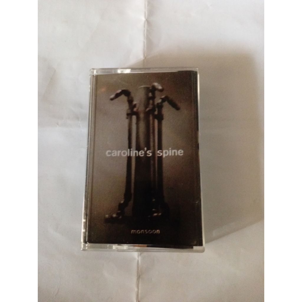 kaset pita Caroline's Spine album Monsoon. produksi tahun 1996. genre alternative Rock