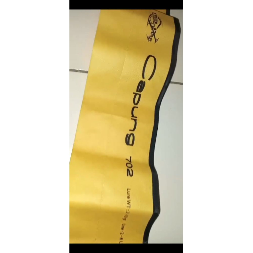 sarung joran capung 702 .