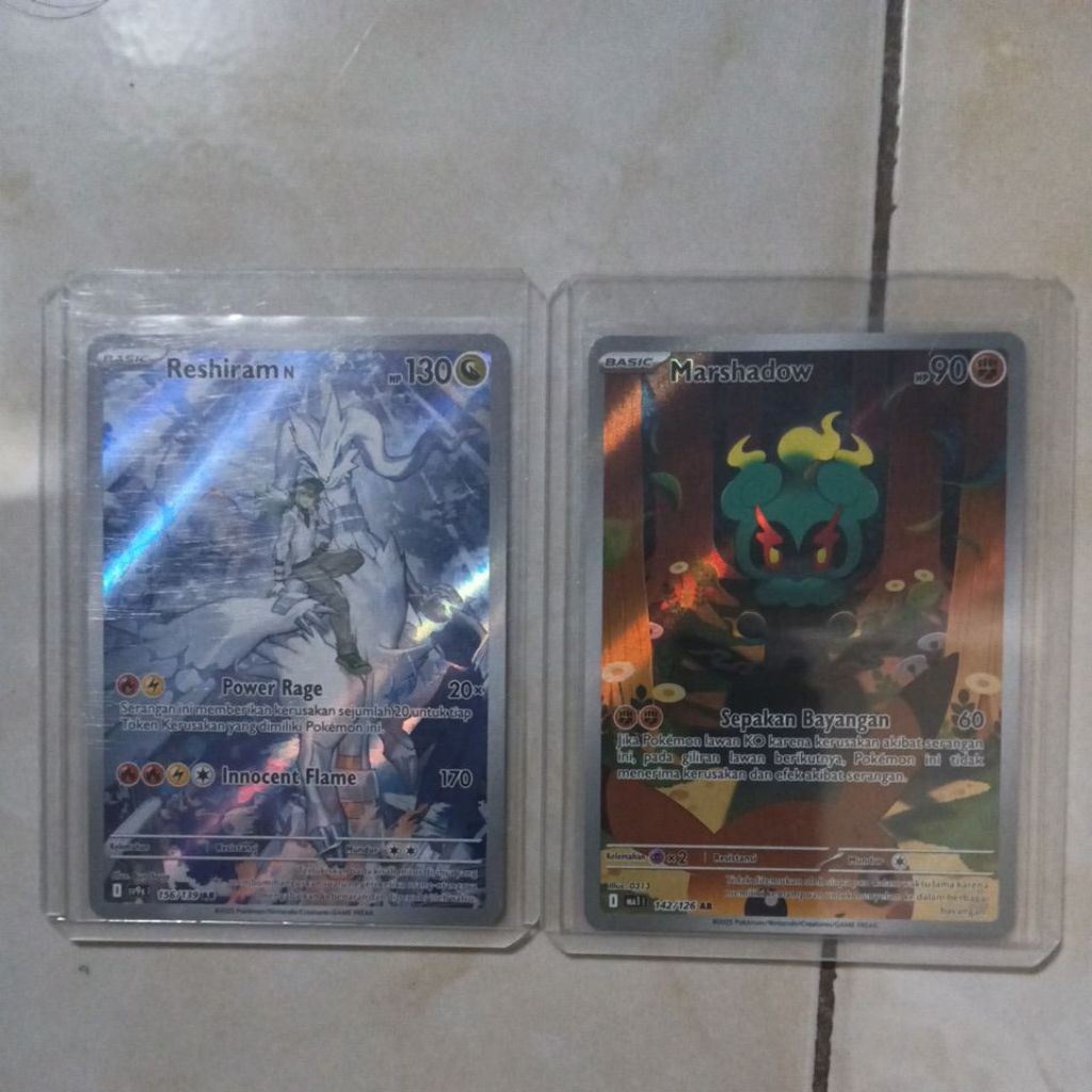 kartu pokemon reshiram AR dan Marshadow AR