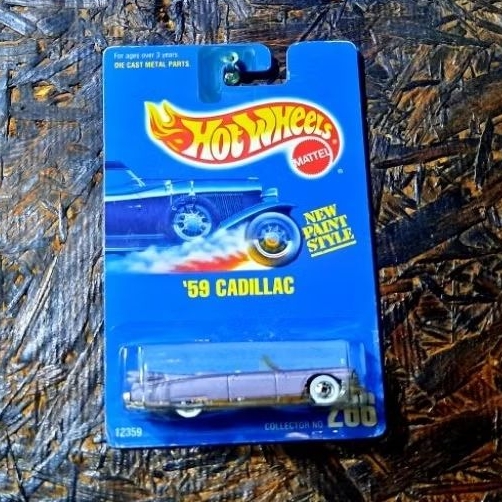 Hot Wheels 59 Cadillac Blue Card White Wall