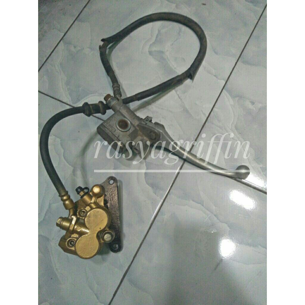 master rem depan set original supra x 125 karisma wave 125