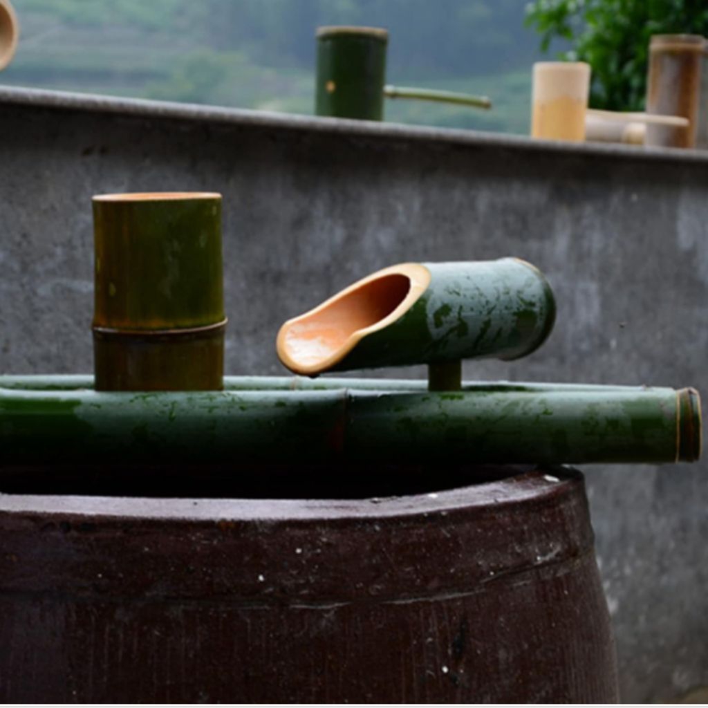 pancuran air bambu hijau sejuk alami