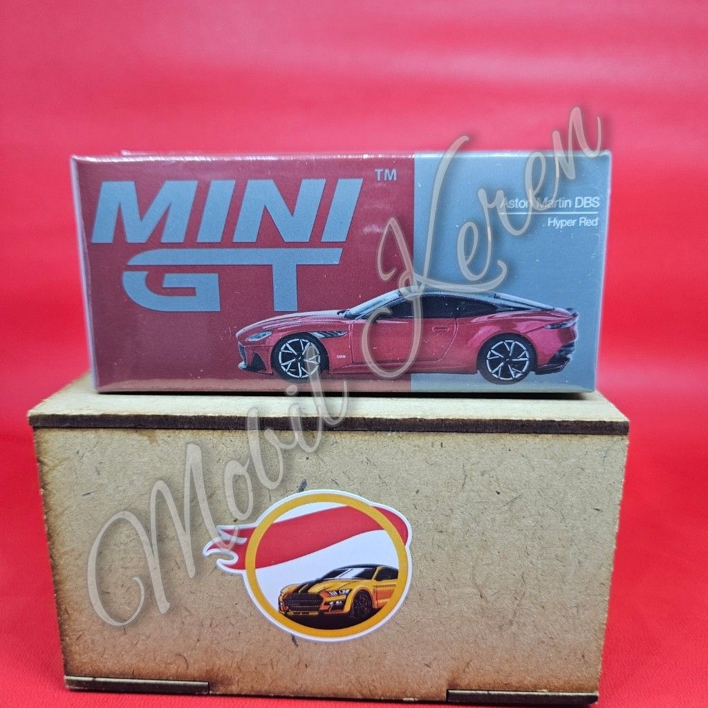 Diecast Mini GT TSM Model 1065 Aston Martin DBS Hyper Red ban karet