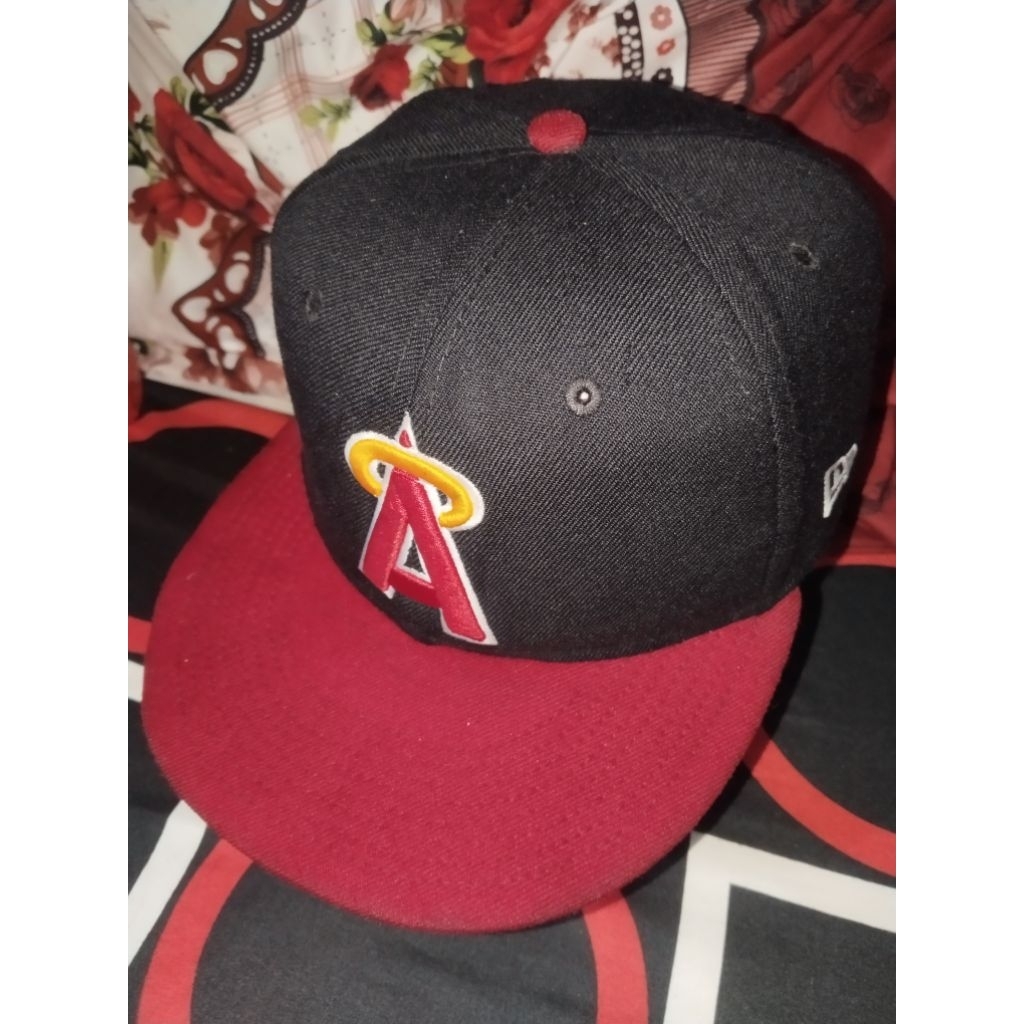 topi new era logo A