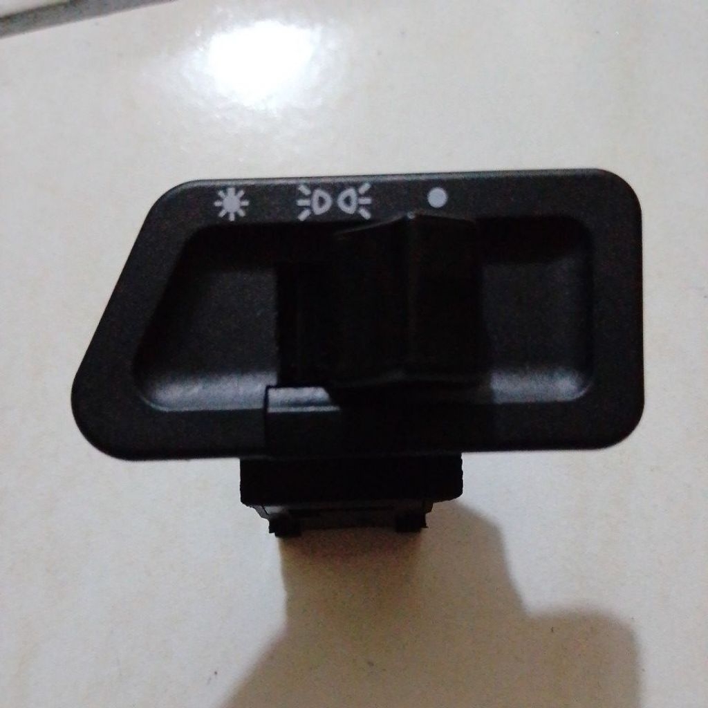 Saklar lampu depan motor Supra 125