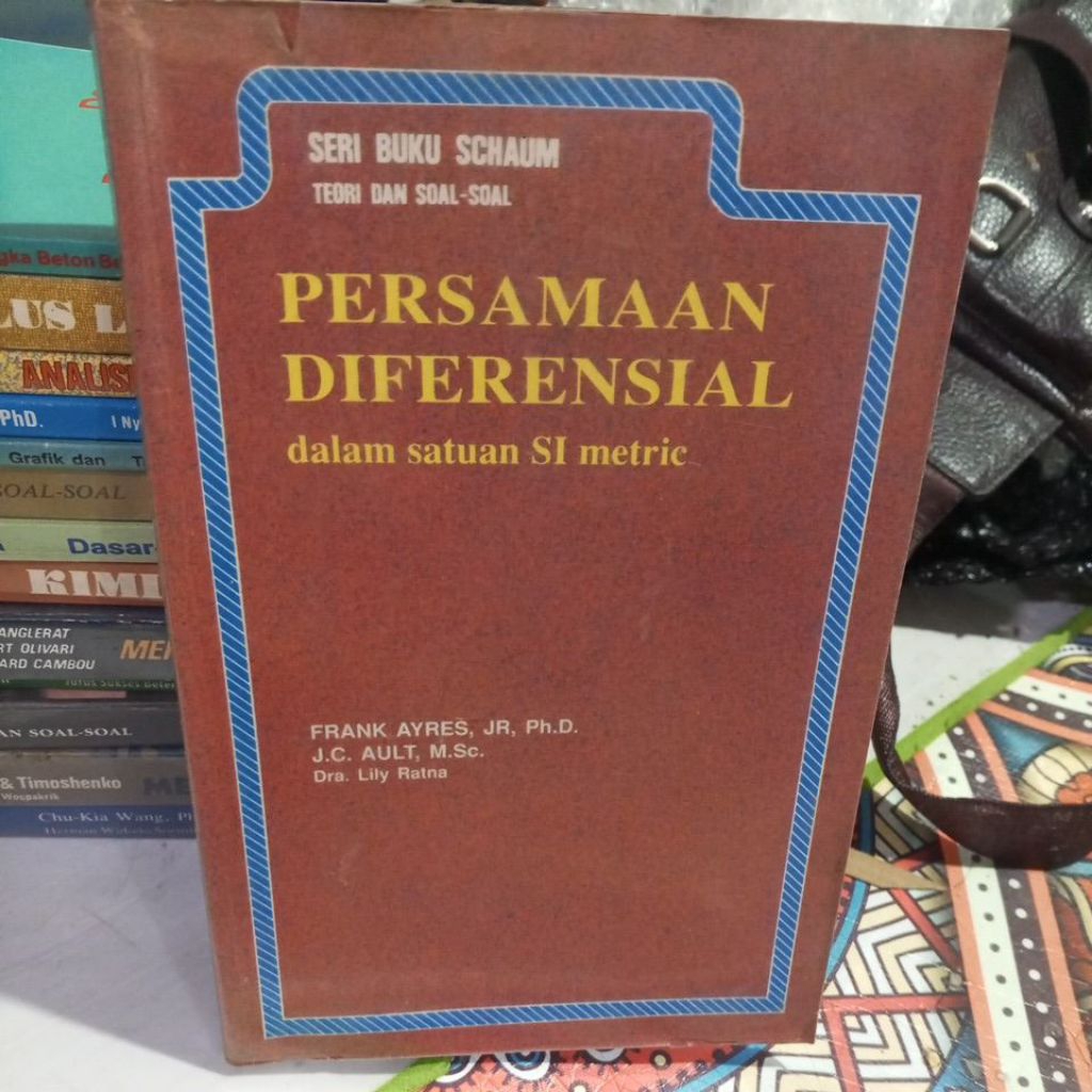 seri buku schaum teori dan soal-soal persamaan diferensial dalam satuan SI metric...Frank Ayres jr.p