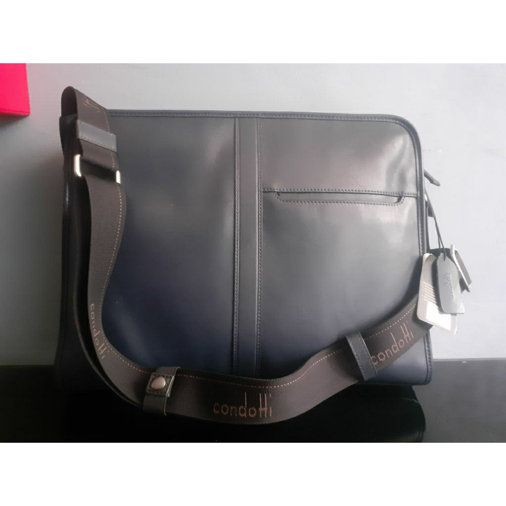 tas kulit condotti baru lama tersimpan