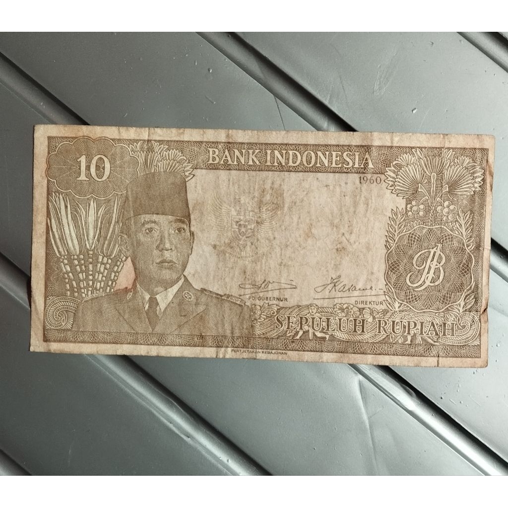 10;rupiah Sukarno thn 1960 tidak bagus kotor original sesuai foto