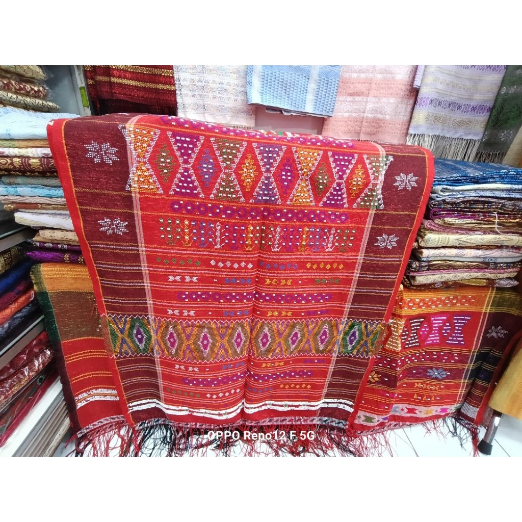 ULOS SADUM SIMATA PITU MARUMBAI SIMATA.