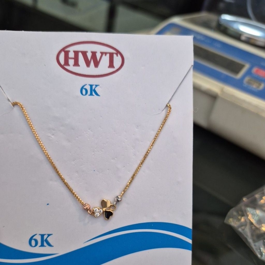 gelang serut hati mata putih +hitam