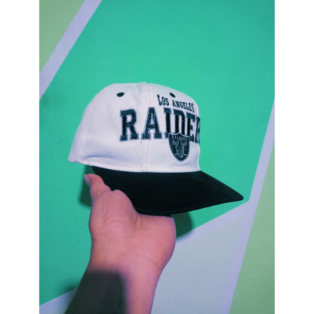 Topi Snapback Bootleg Raiders Tripower