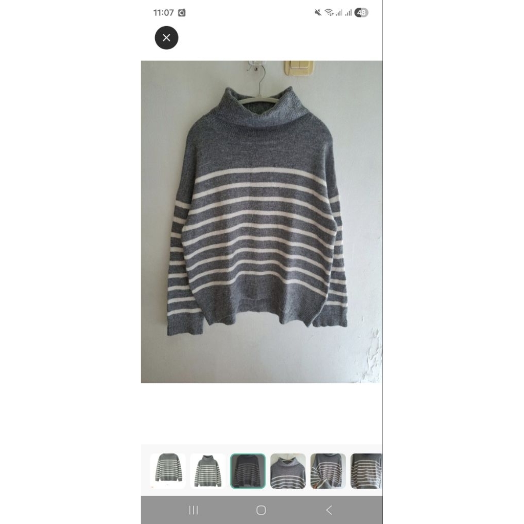 GU BORDER OVERSIZED TURTLENECK SWEATER