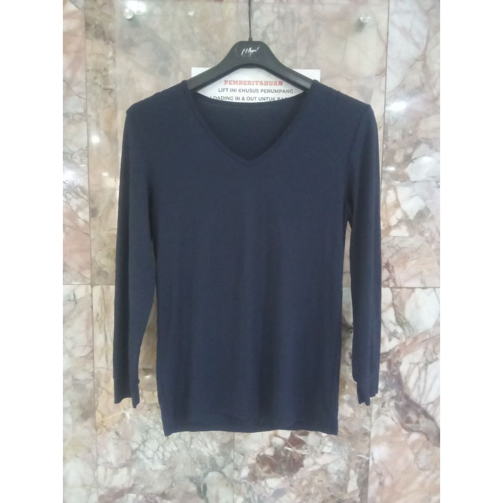 sale kaos Heattech GU size S