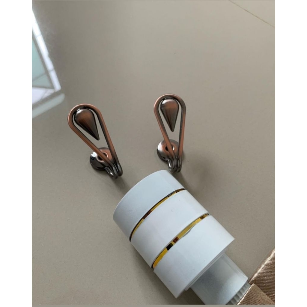 Hok Gorden atau pengait tali gorden    Harga satuan trima jasa pasang dan jasa uap untuk wilayah Ban