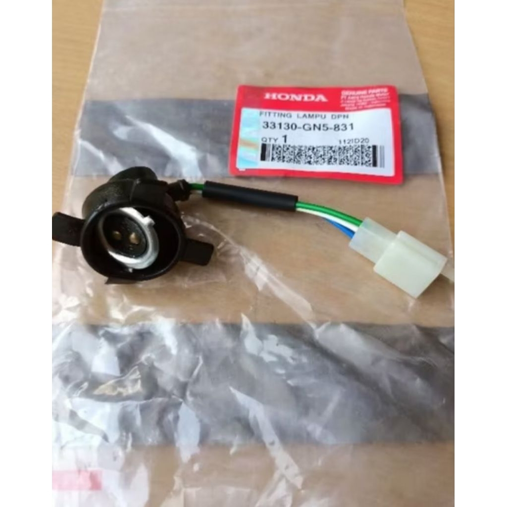 SOKET/FITING LAMPU DEPAN GRAND ORIGINAL