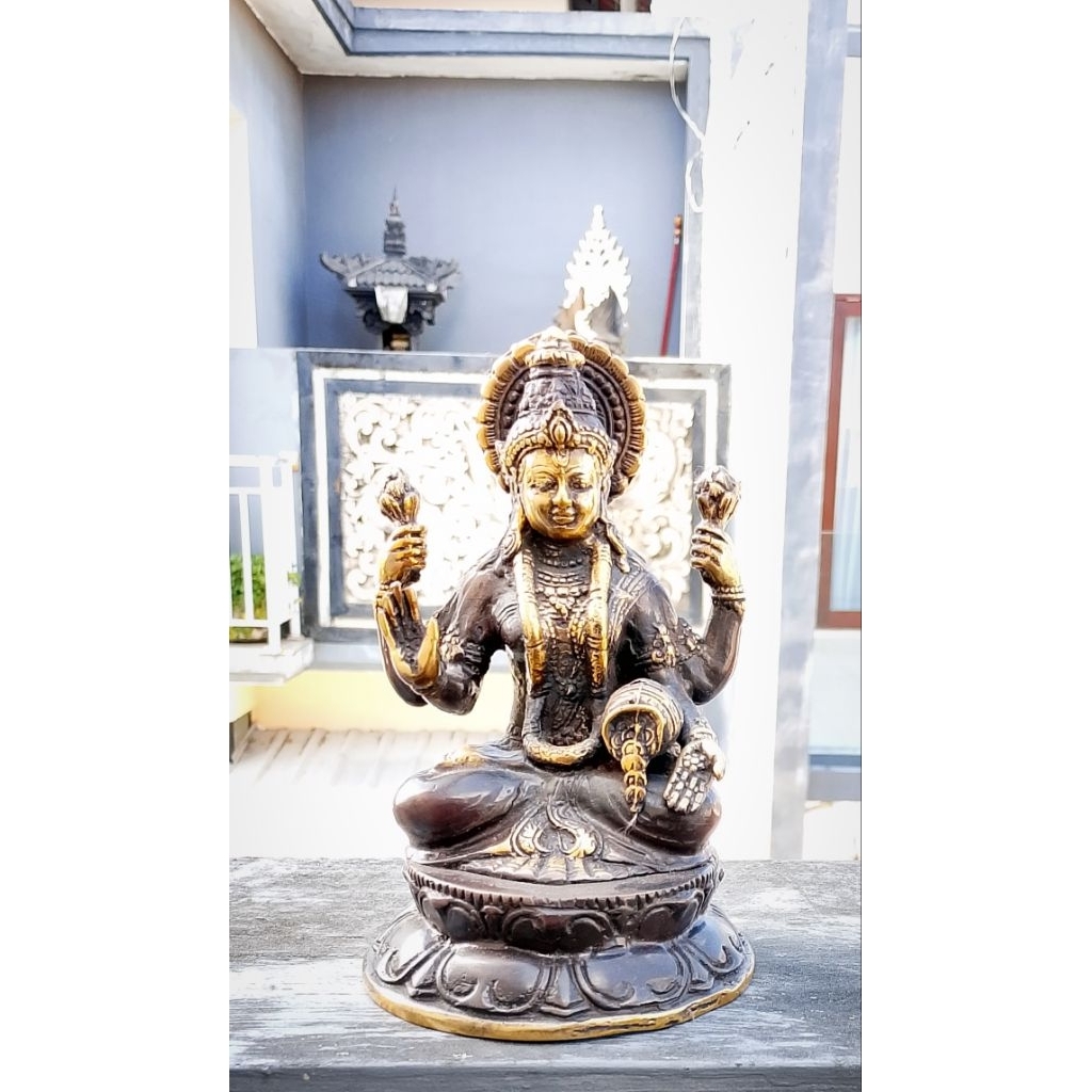 Patung Dewi Sri Laksmi bahan logam Kuningan atau patung rambut sedana