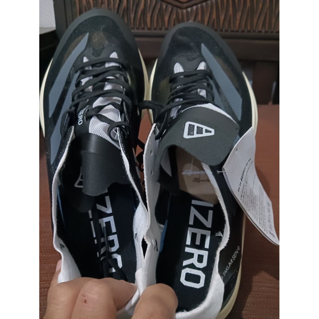 Sepatu adizero takumi uk 42