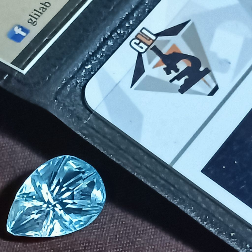 Natural Blue Topaz / Swiss Blue / Pear / 5.90ct / GLI memo