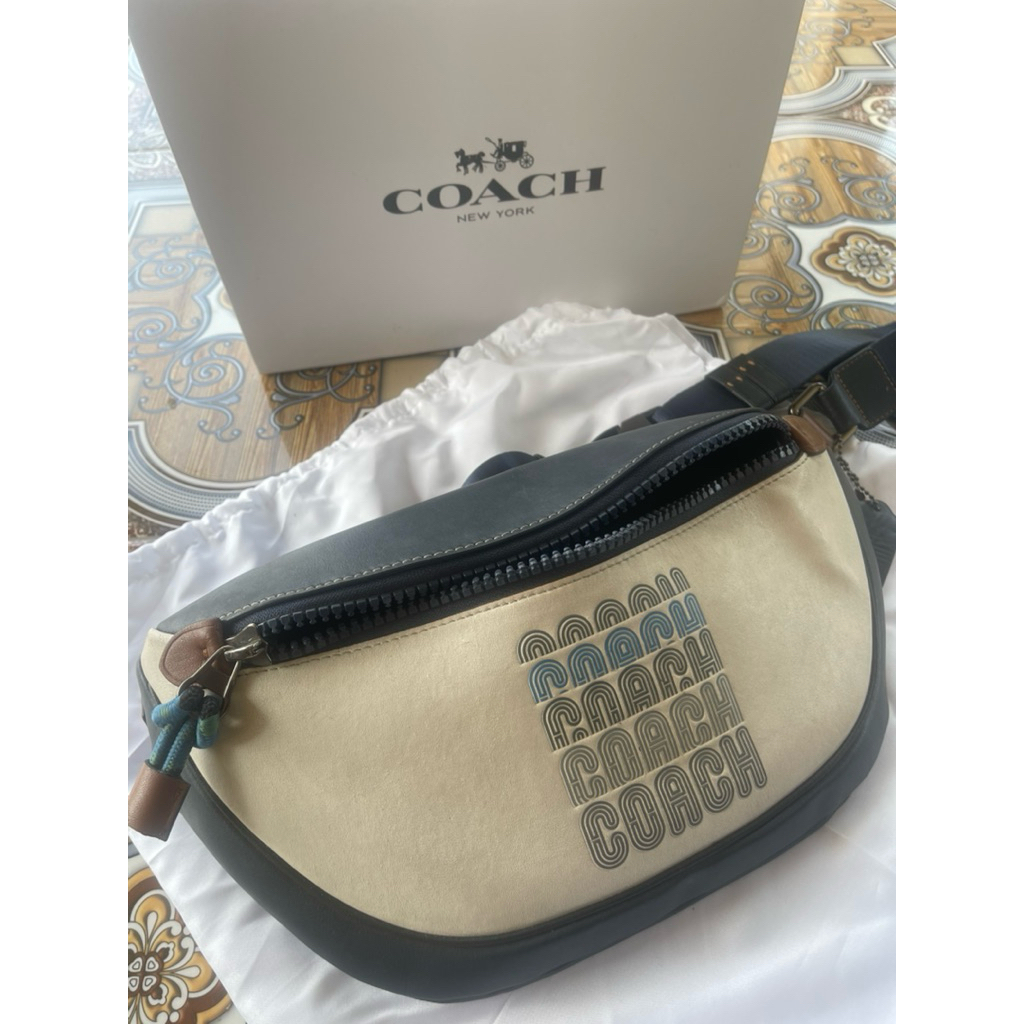 PRELOVED_TAS_COACH_PRIA