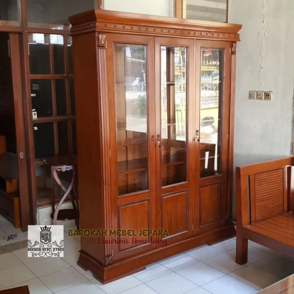 lemari buku jati minimalis , lemari penyimpanan serbaguna 3 pintu , lemari piring kayu jati kuat kok
