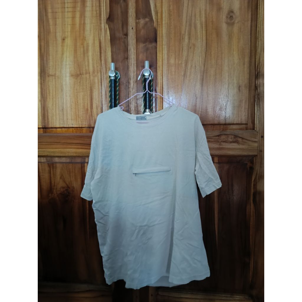 baju umroh kantong doraemon