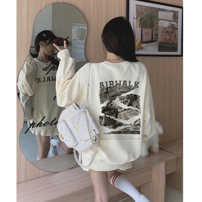 MONSEUR Sweater lengan panjang wanita Korea dengan motif cetakan koran retro dan kerah bulat/ Cewek 