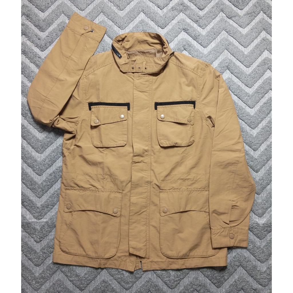 Jaket Design united parka non hoodie coklat outdoor windbreaker unisex