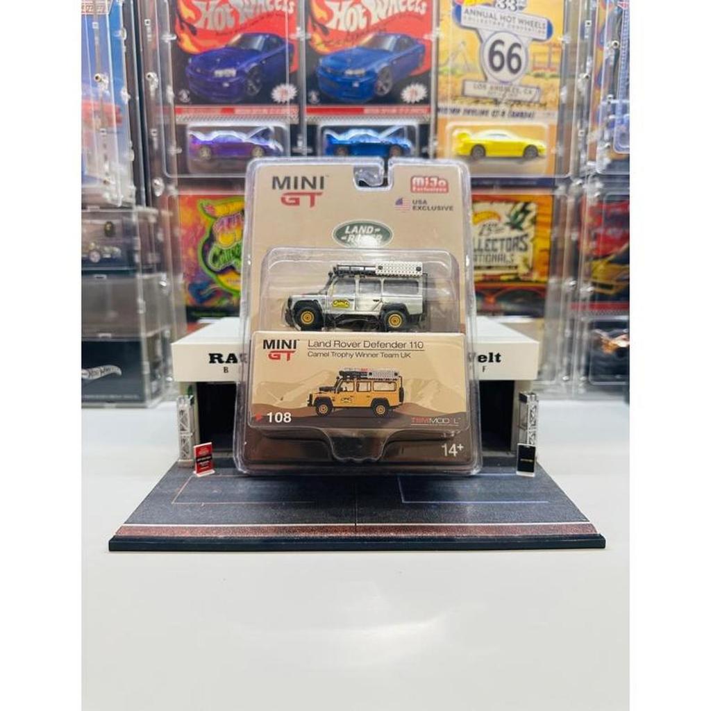 Mini GT CHASE No 108 Land Rover Defender 110 Camel Trophy Winner Team UK Mijo Exclusive