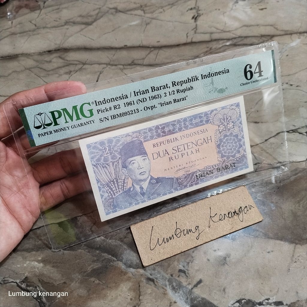 uang kuno irian Barat 2,5 Rupiah PMG 64