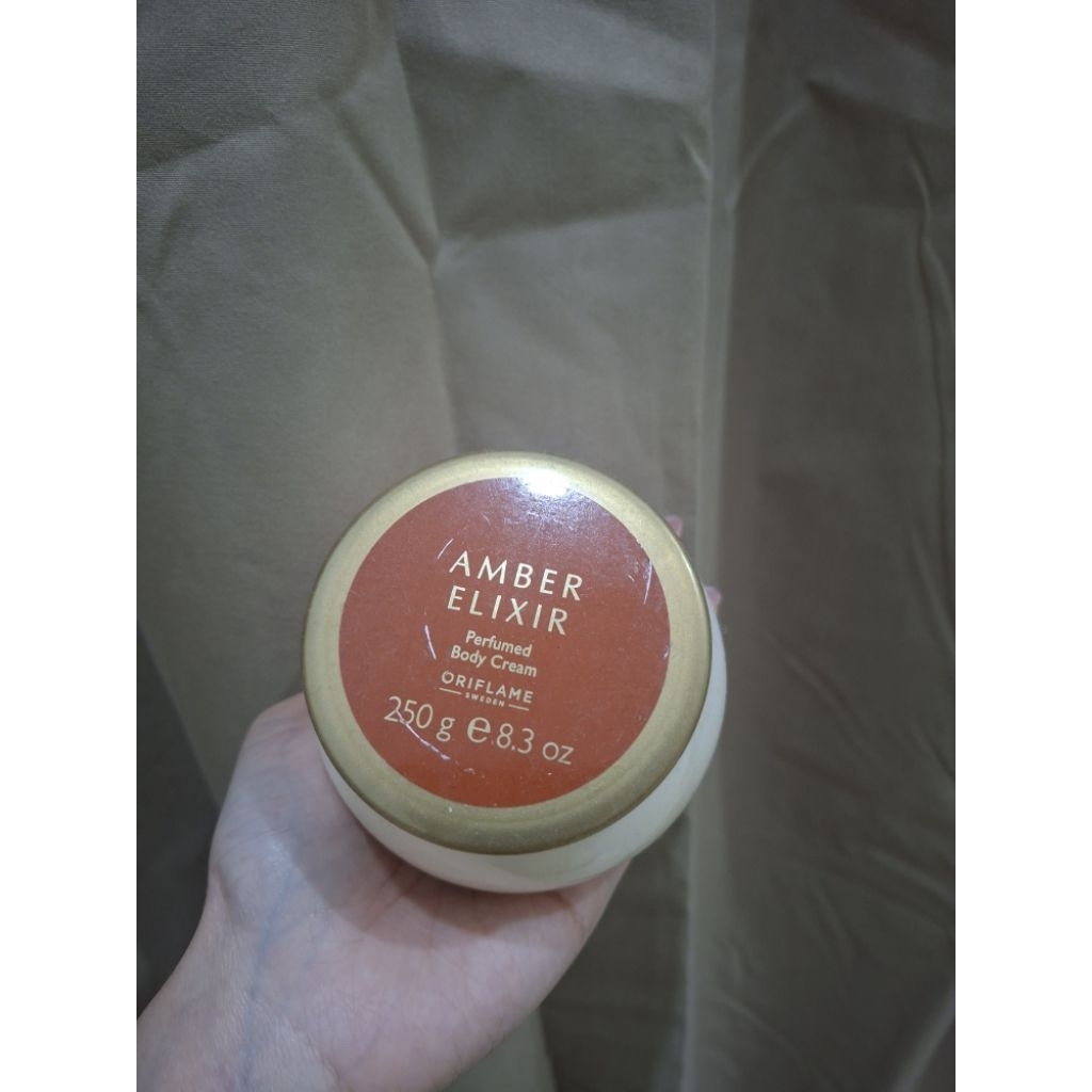 Preloved body lotion oriflame Amber Elixir