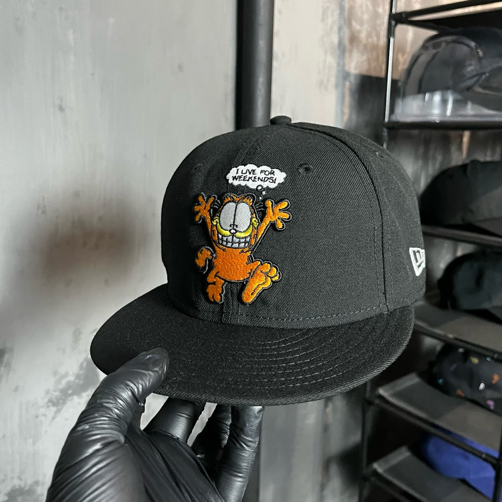 Topi new era x garfield for weekends